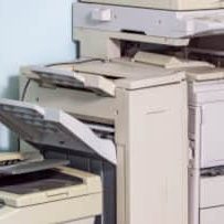 Old-Broken-Office-Equipment-Stands-On-The-Floor-In-The